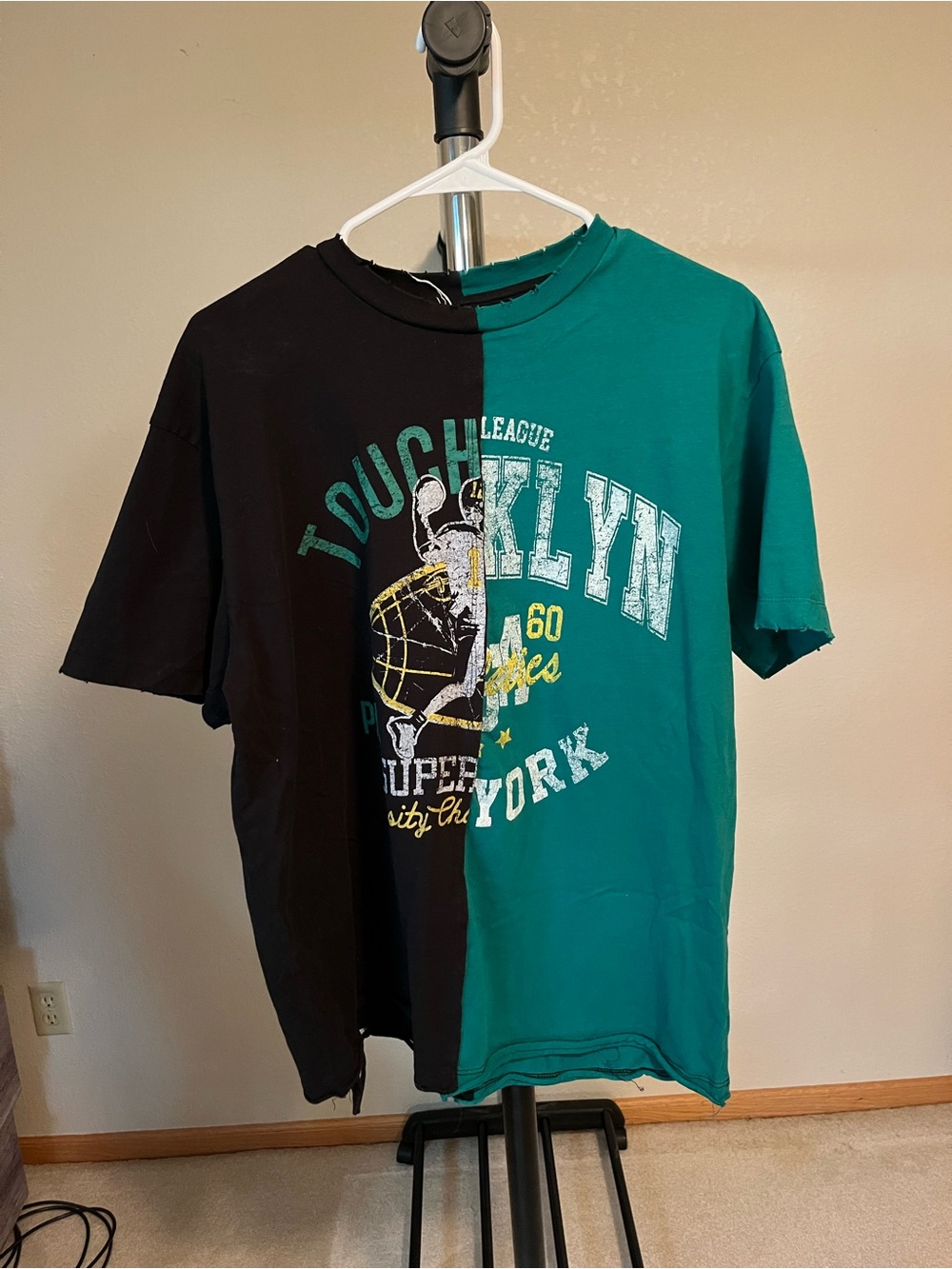 Rebels Two-Tone Black and Teal Graphic Short Sleeve Tee